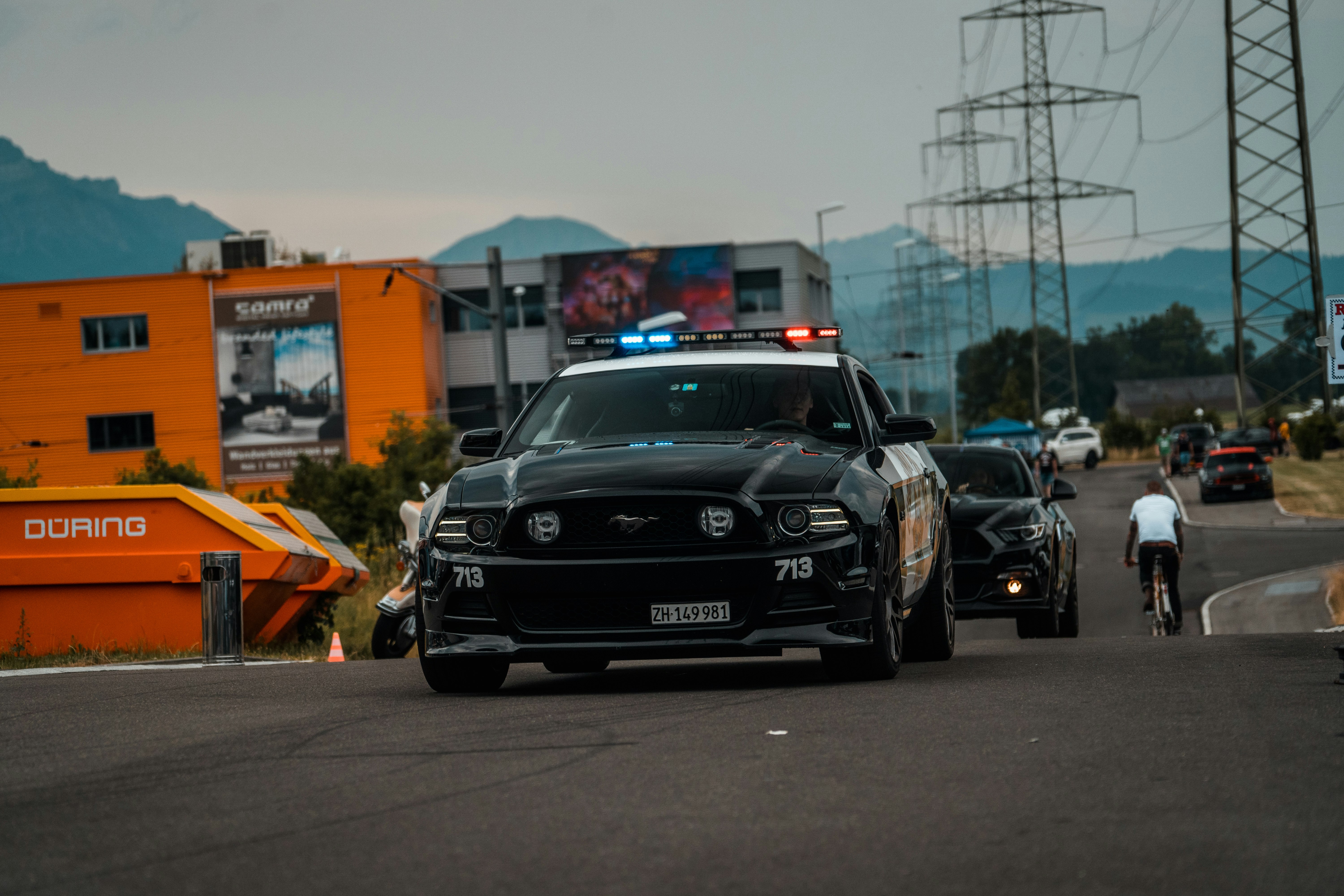 black vehicle on road close-up photography